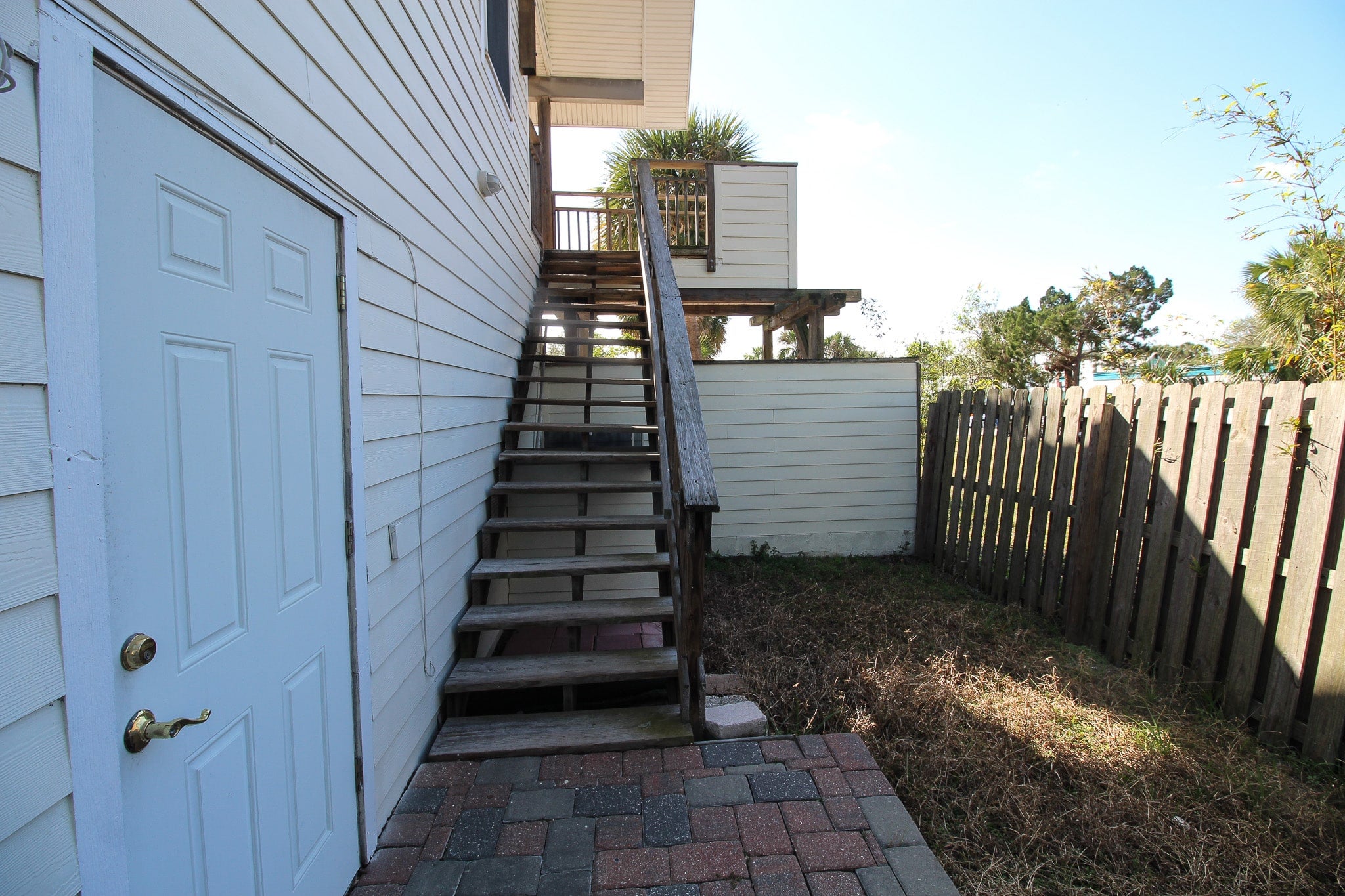 Outside stairs lead to condo