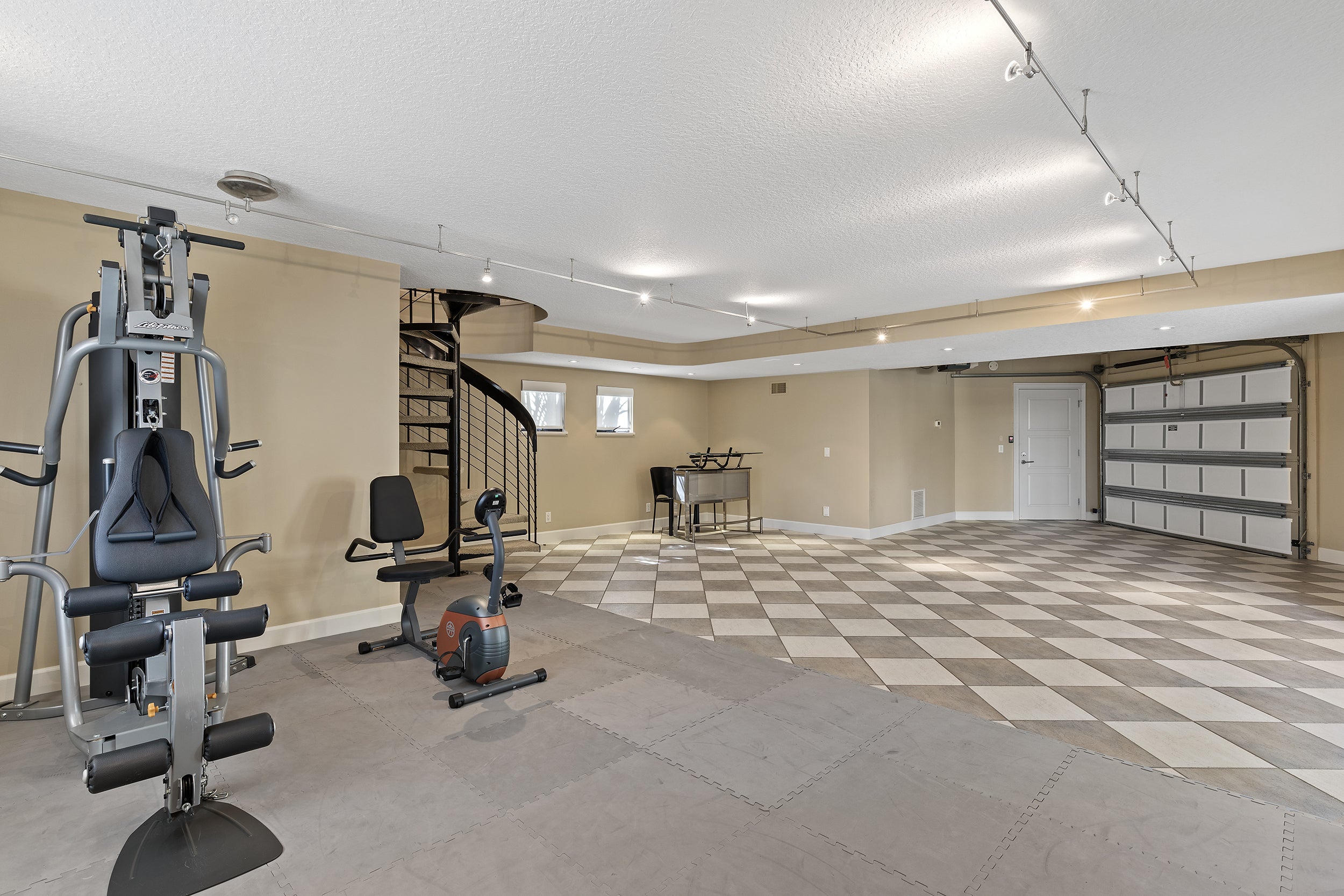 Fully renovated garage with exercise machine