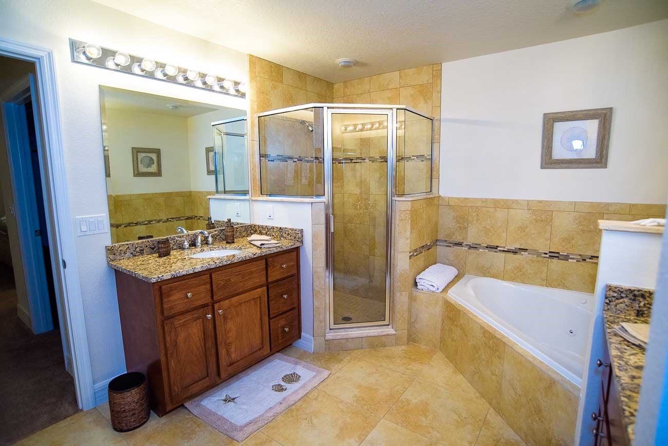Shower and tub in the primary bathroom