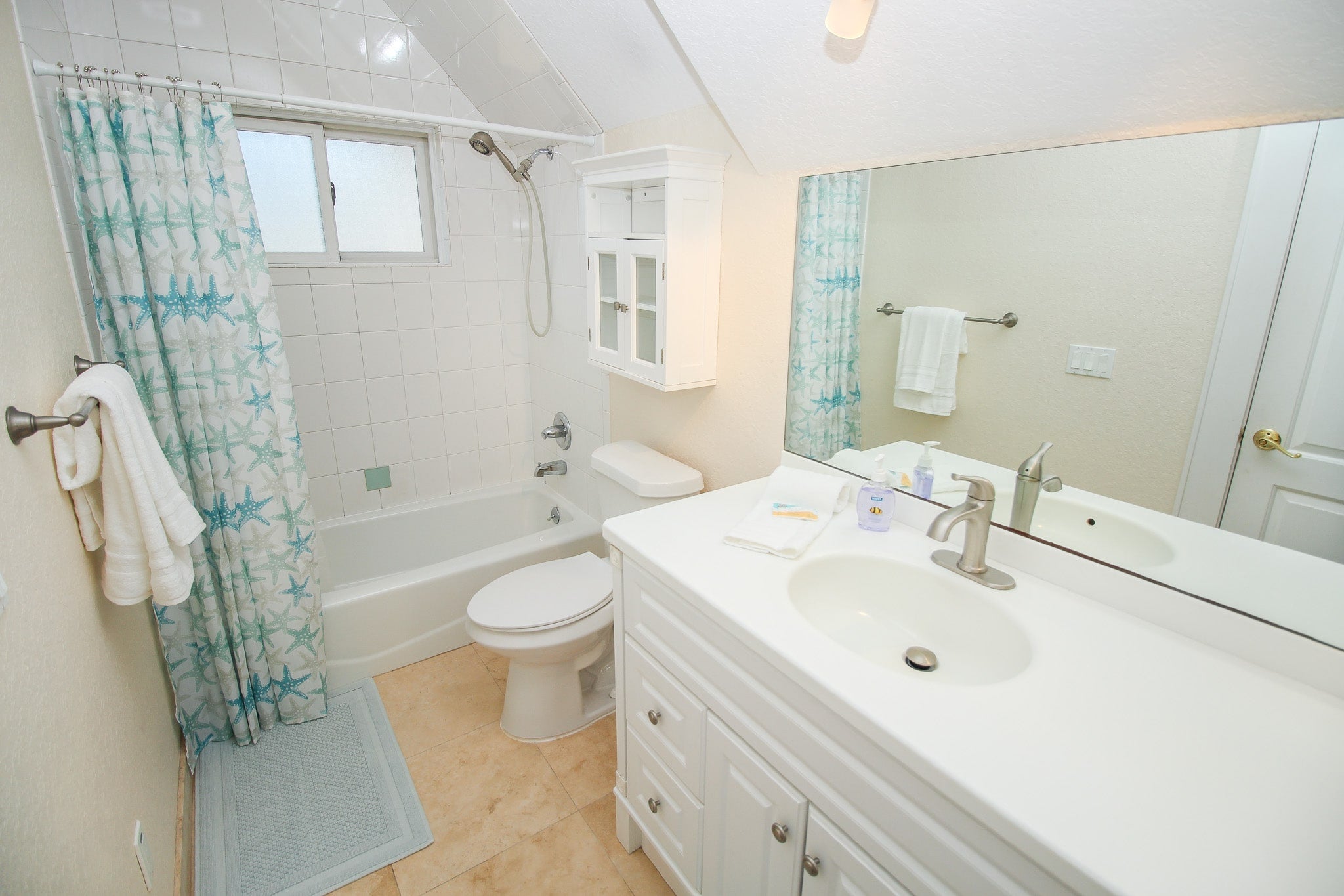 Primary bathroom with shower & tub combo