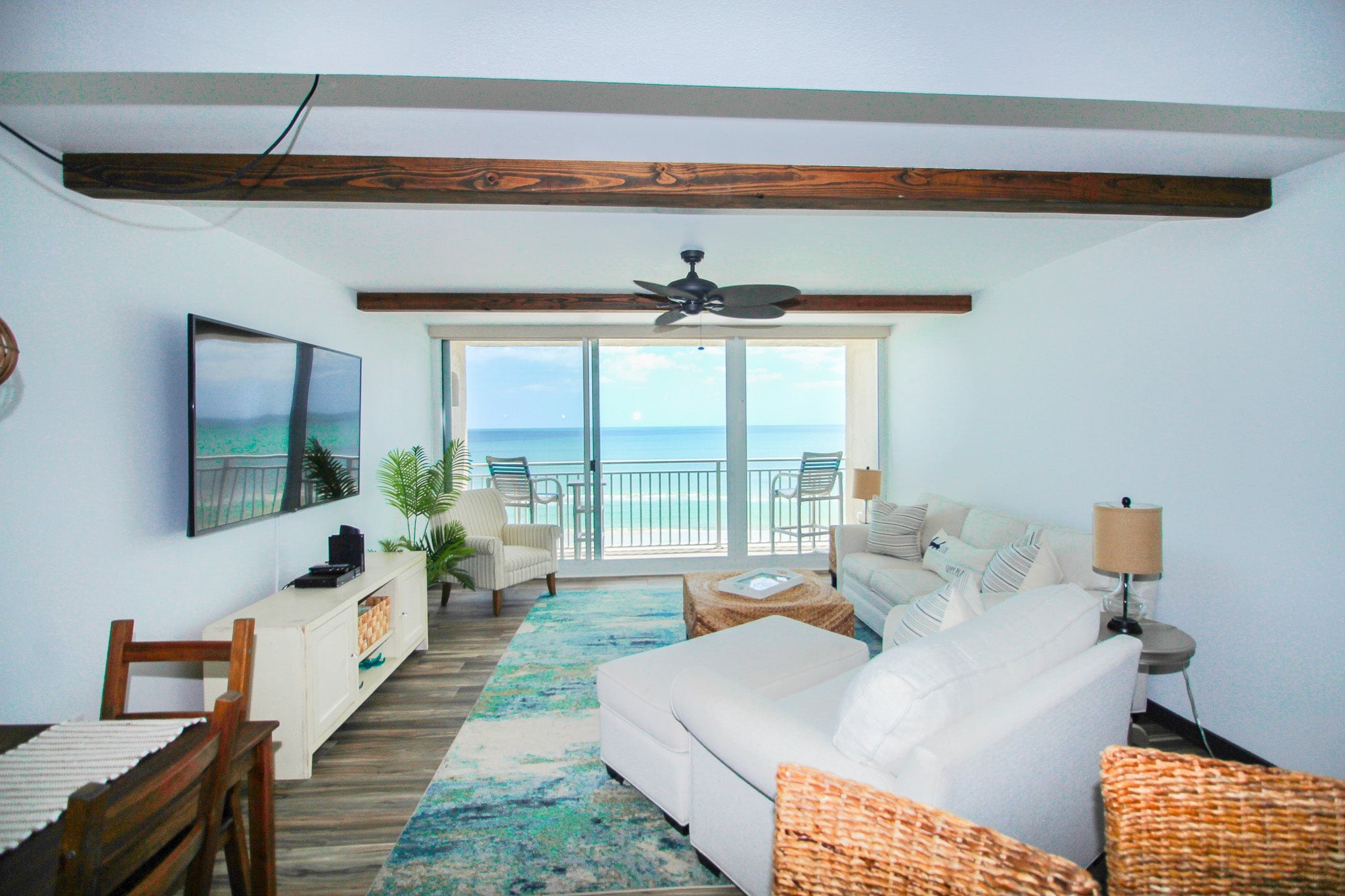 Tastefully decorated living room with stunning oceanfront view