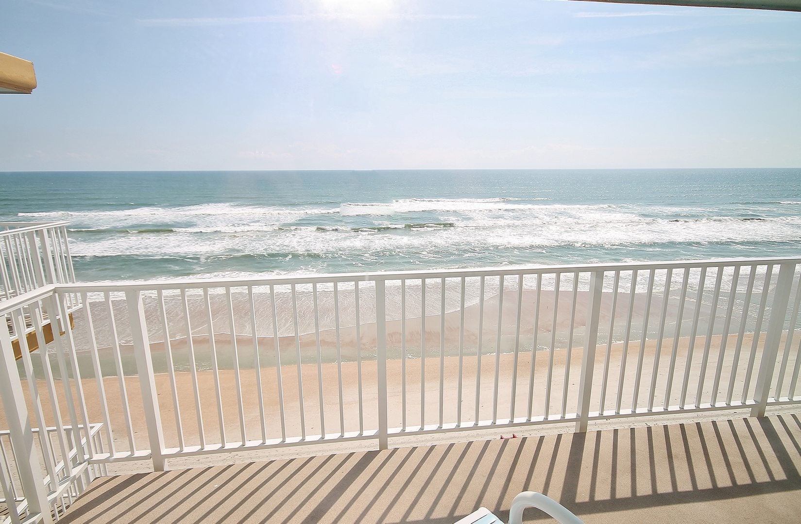 Listen to Waves on this Furnished Balcony