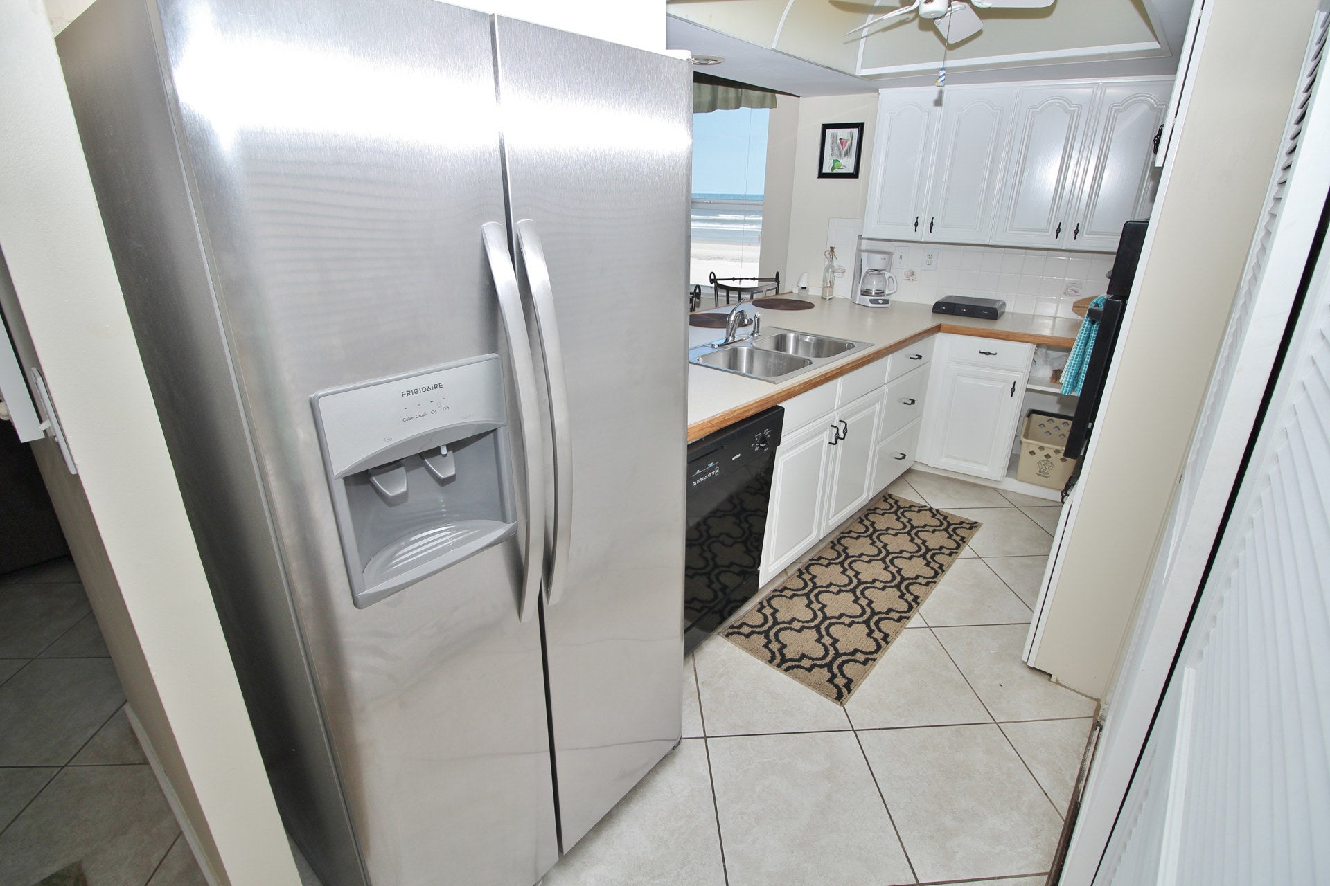 Stainless steel fridge in the kitchen