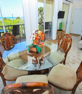 See the beach from the dining table