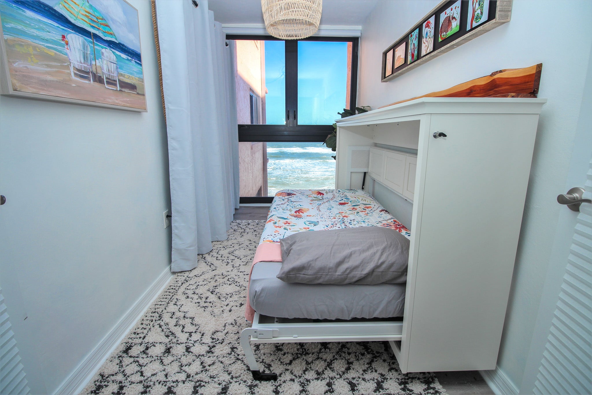 Sunroom has a twin cabinet bed that folds up
