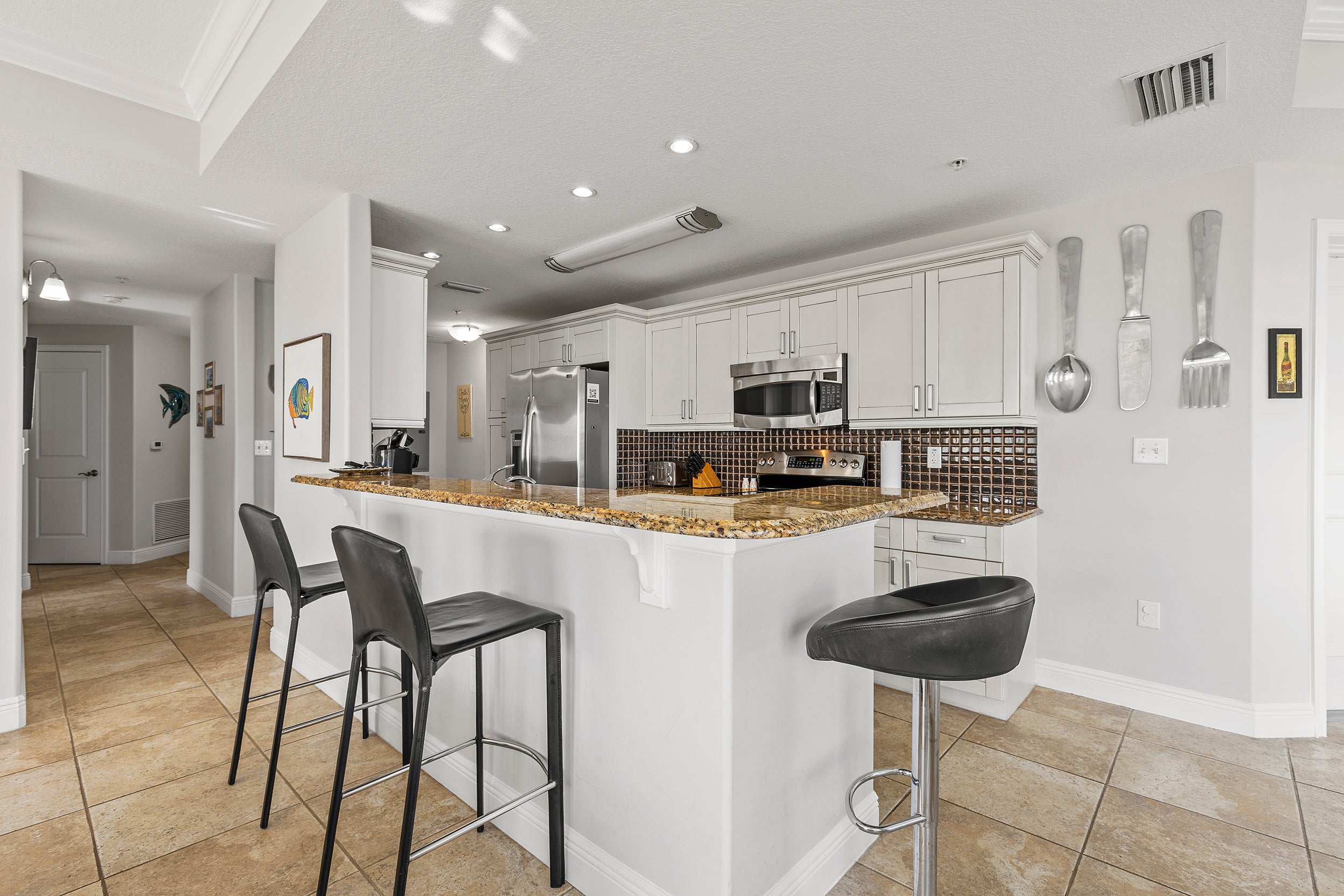 Modern kitchen with counter seating for 2