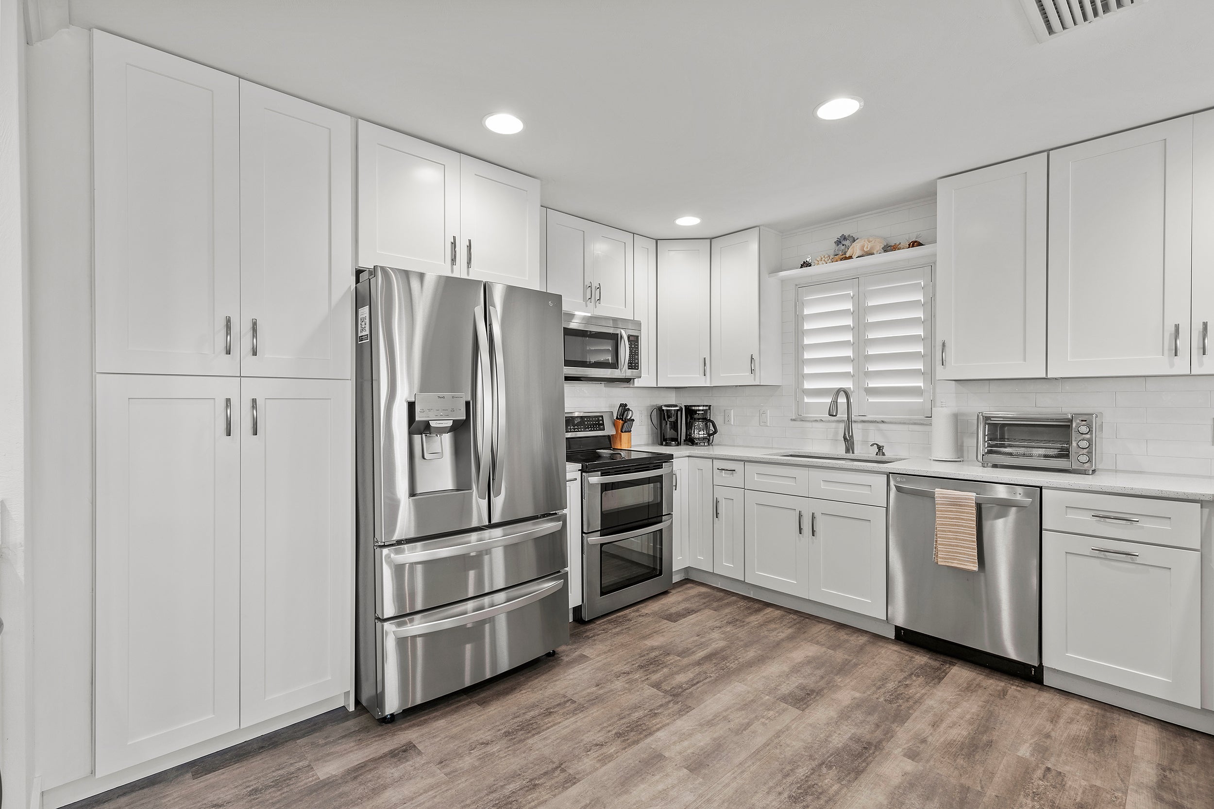 Fully Stocked Kitchen with Stainless Steel Appliances