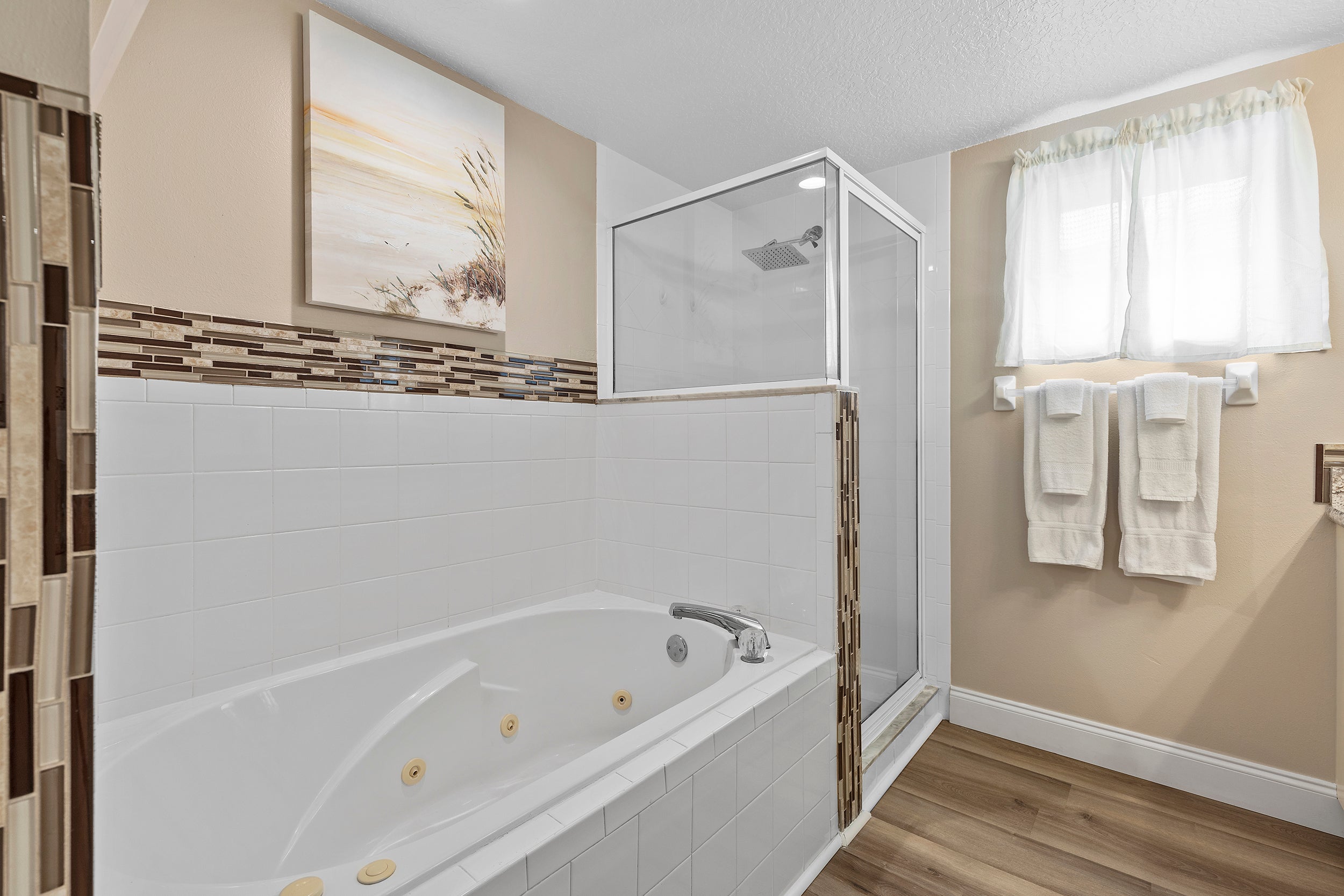 Primary Bathroom with Jacuzzi Tub and Walk-In Shower