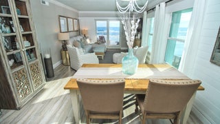 Dining+room+has+wrap-around+views+of+ocean