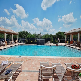Unwind in one of the two community pools
