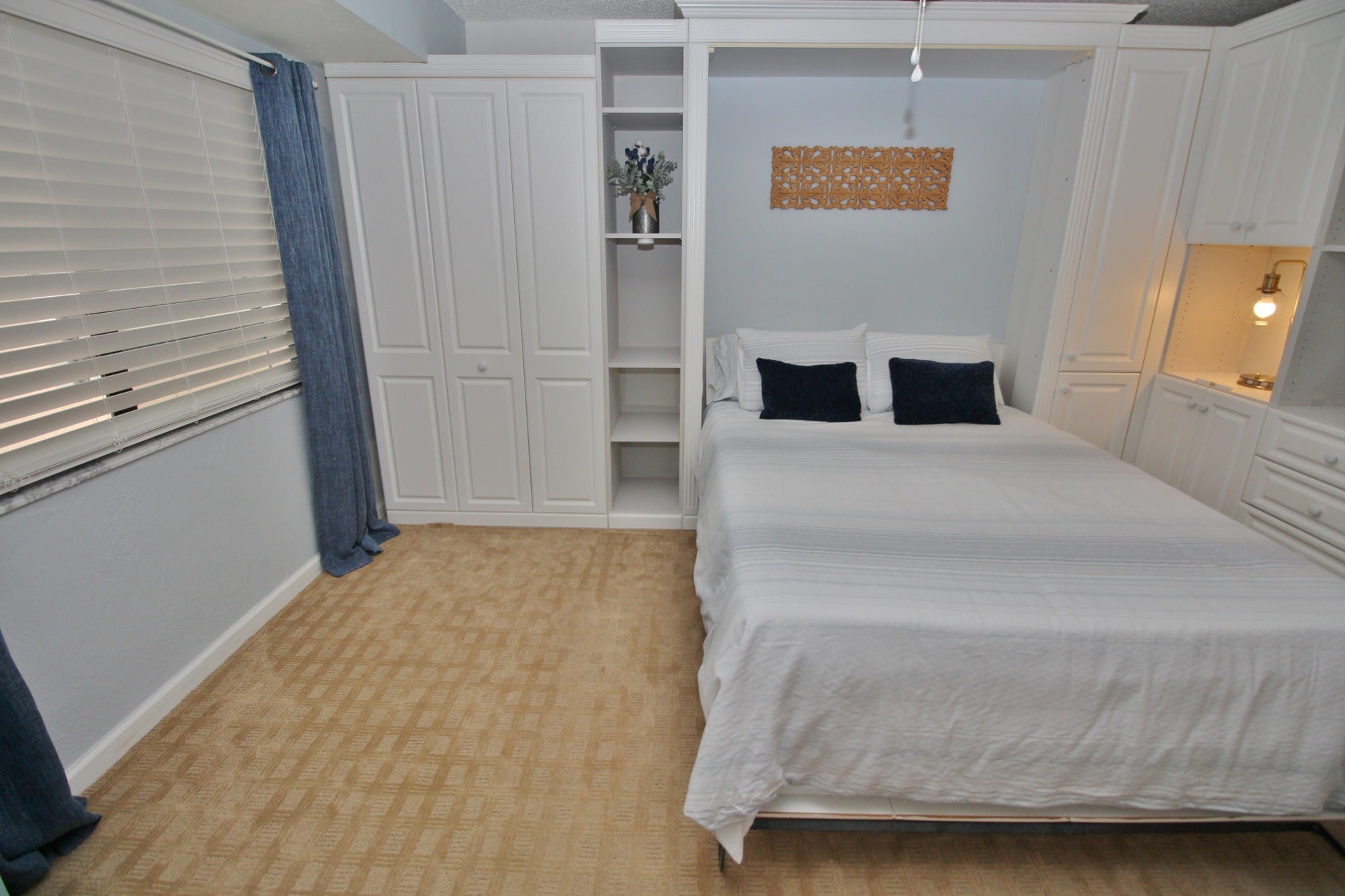 The Second Bedroom that Features a Murphy Bed