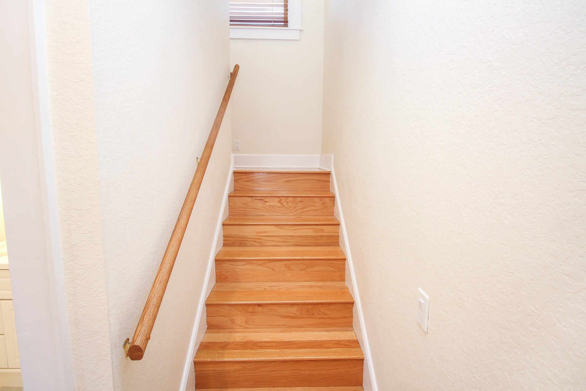 Stairs lead to loft