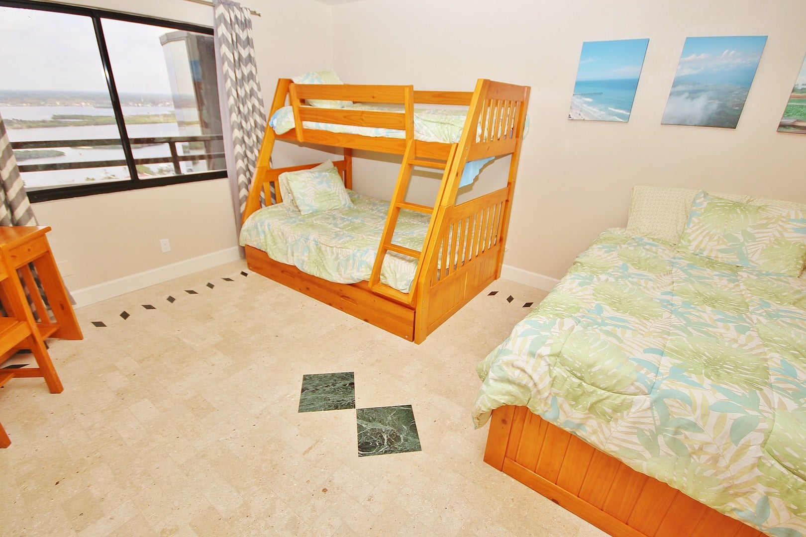 The second bedroom features a double bed and a bunk bed that as a double on the bottom