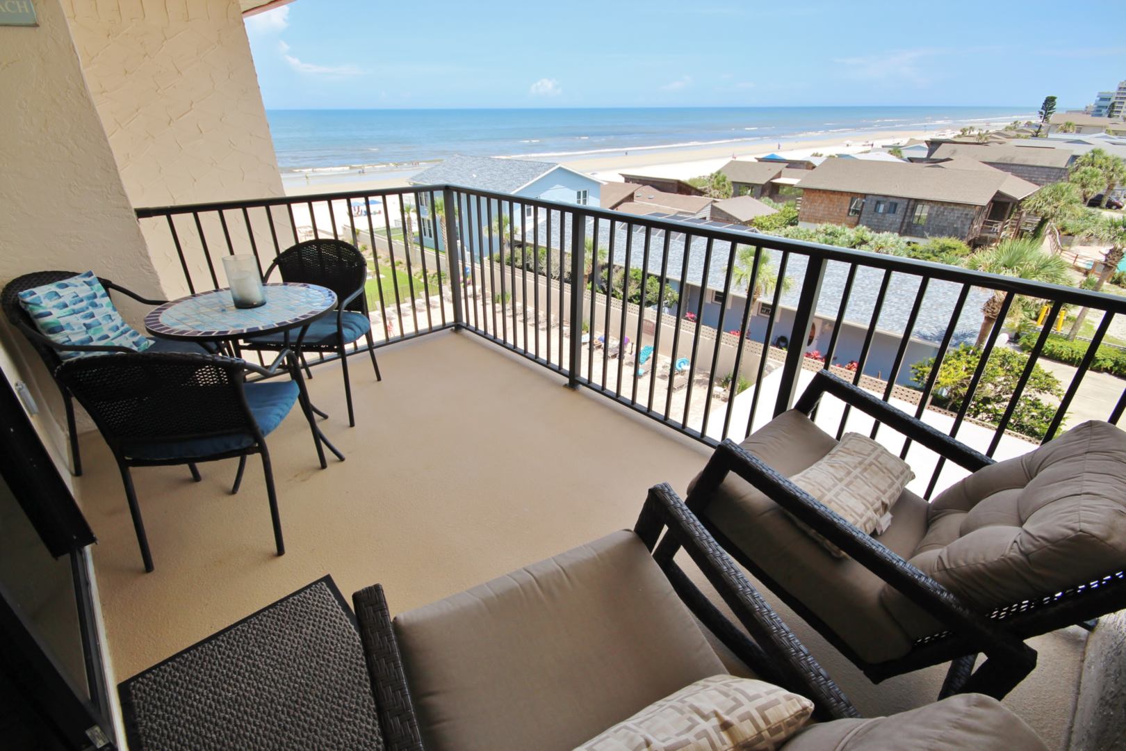 You can see the beach from this furnished balcony
