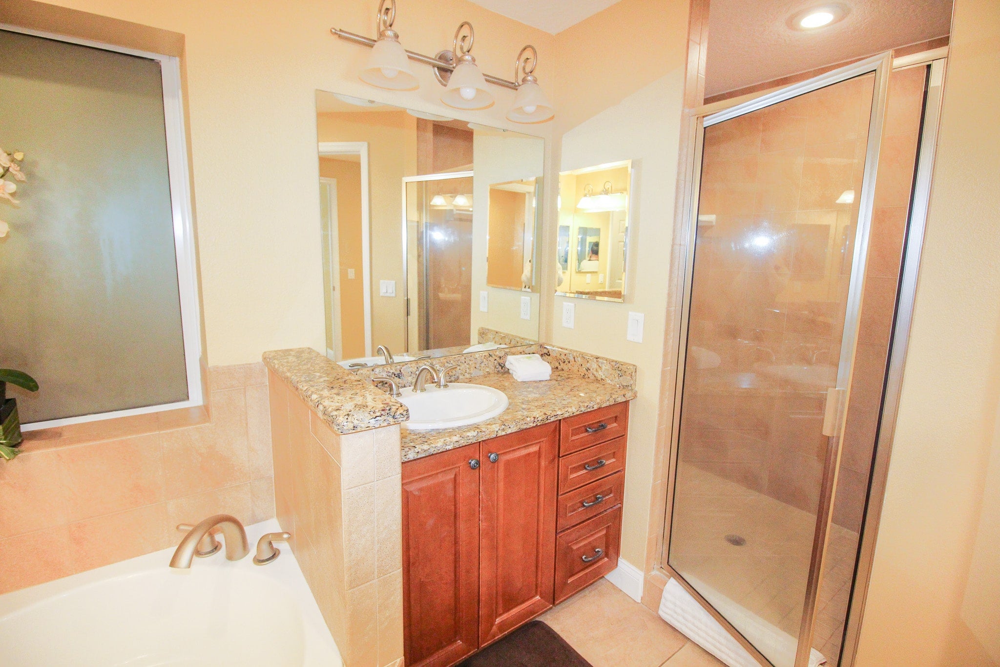 Double sinks and walk-in shower