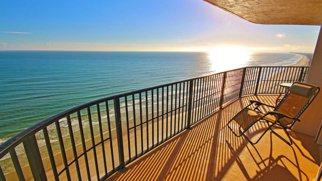balcony overlooking the ocean during sunrise